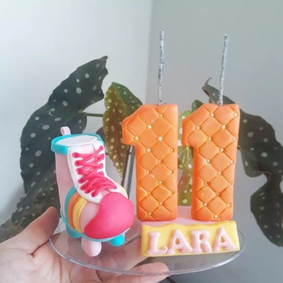 Vela em Biscuit Patins